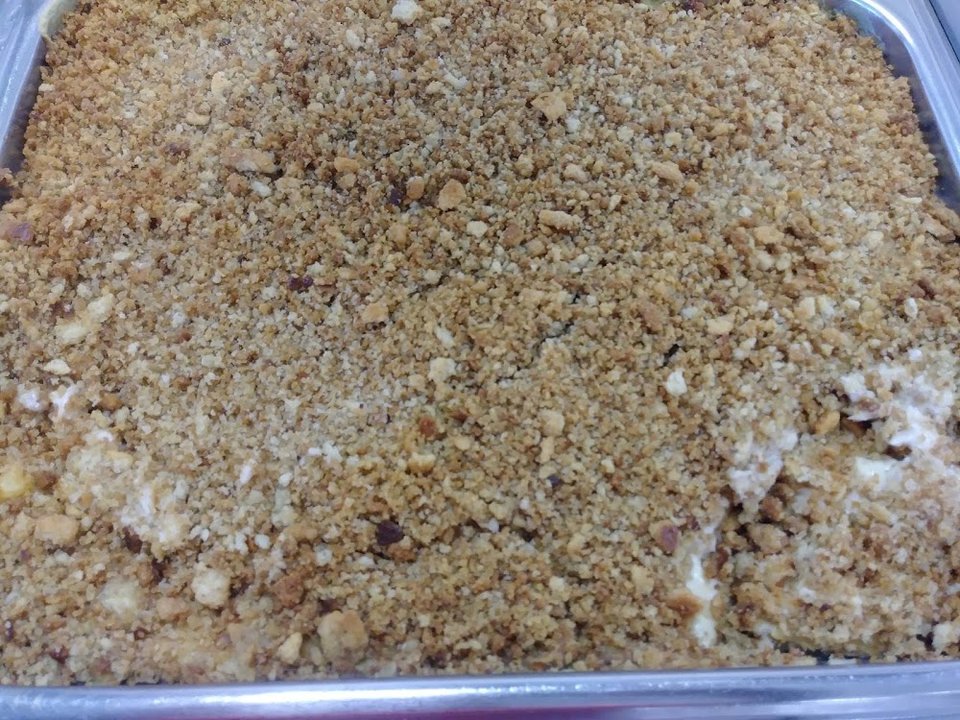 Lunch and dinner buffet with cobbler and pudding.